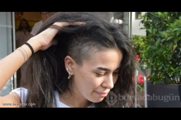 Asena Erkin saçlarını kazıttı