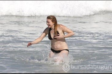 Bikininin azizliğine uğradı!