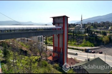 Tepedeki mahalle için asansör