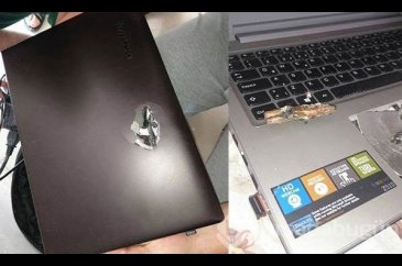 Teröristin kurşunu şans eseri laptopa denk geldi