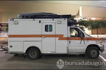 Eski ambulansı karavana çevirdi