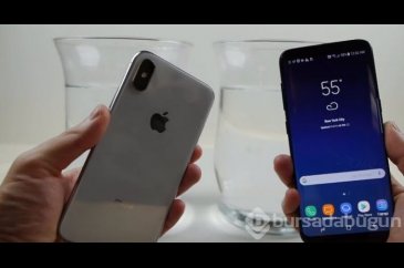 iPhone X'i su dolu kaba koyup, dondurdular!