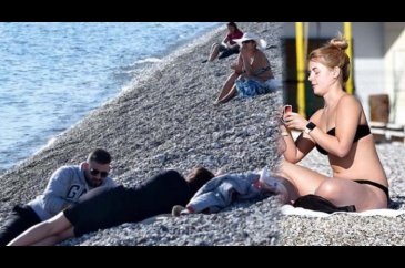 Antalya'da güneşli havayı fırsat bilenler denize girdi