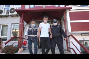 Bursa'da aracına çıplak kadın afişi astı