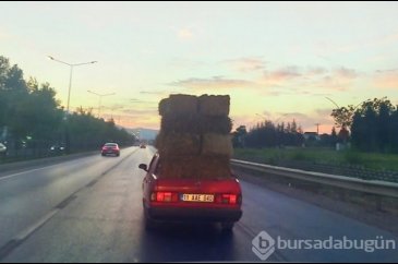 Bursa'da aracının üzerinde saman balyaları taşıdı