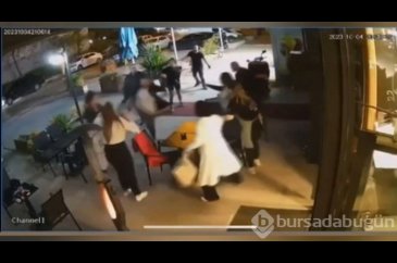 Kafenin bahçesinden motosikletle geçti