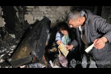 Yanan evlerinde, 3'ünü de SMA'dan kaybettikleri çocuklarının fotoğr...