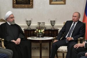 Üçlü zirve öncesi Putin ve Ruhani bir araya geldi