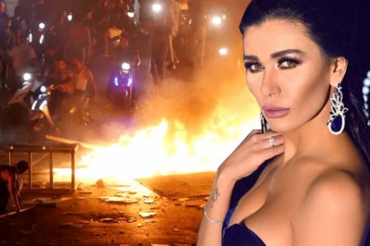 Ünlü oyuncu Nadine Al Rassi vergi protestolarına katıldı, lastik yaktı