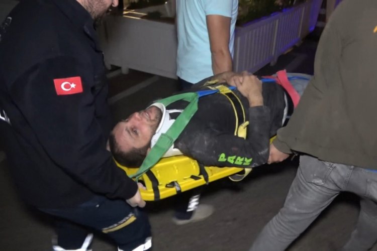 Bursa'da mağaza tadilatında çalışan genç işçi yüksekten düşerek yaralandı