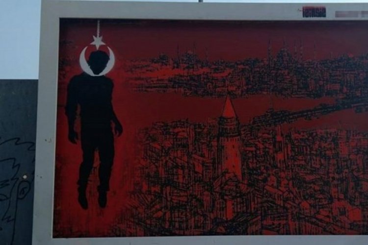 Reklam panosuna çıkartma yapıştıran şüpheli tutuklandı