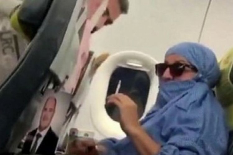 Uçakta olay çıkaran kadına tahliye