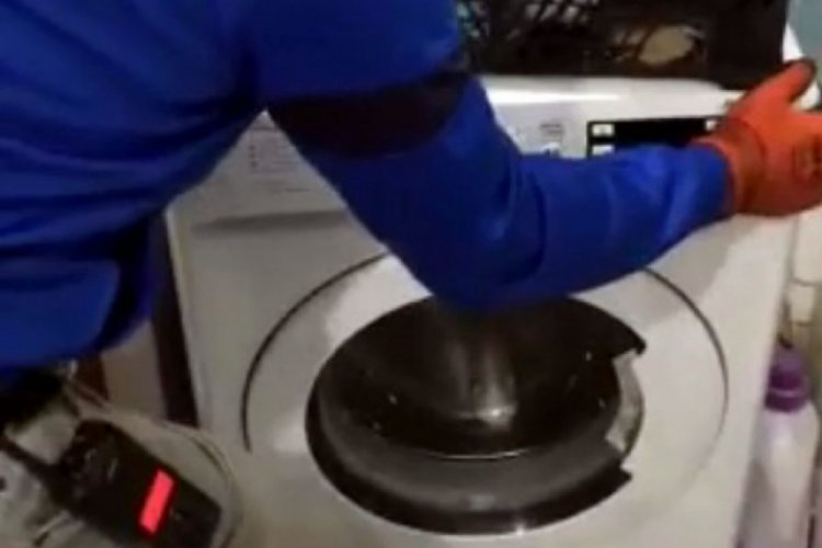 Çamaşır makinesindeki gizli bölmede 7 bin paket kaçak sigara ele geçti