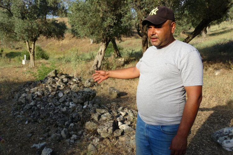 Babası ve kızının mezarının bulunduğu araziyi ihalede başkası alınca yıkıldı