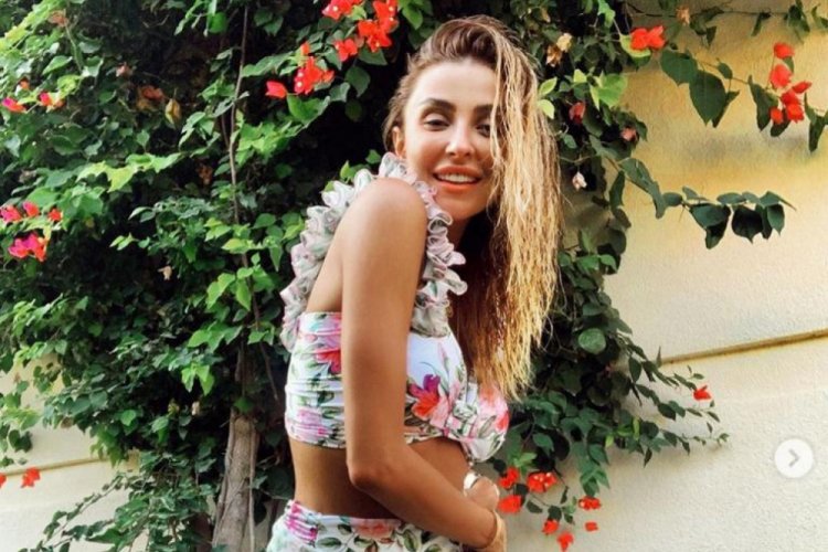 Özge Ulusoy deniz ve güneşin tadını çıkarıyor