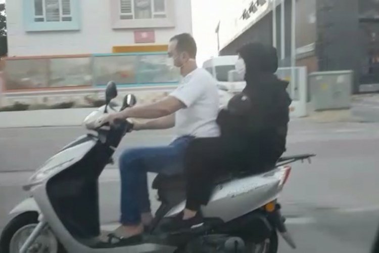 Bursa'da motosiklet üzerinde bebekli çiftin tehlikeli yolculuğu