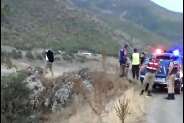 Baraj gölüne uçan araçtan sağ kurtarıldılar