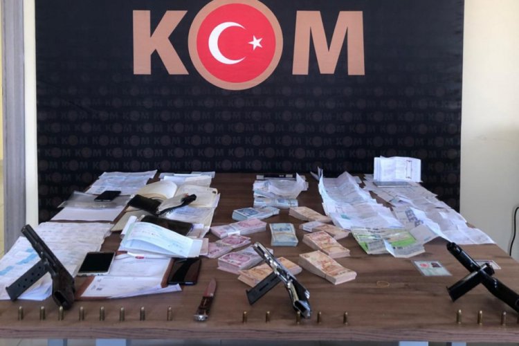 Tefeci operasyonunda 100 bin lira, silah ve borçlu ajandaları ele geçirildi