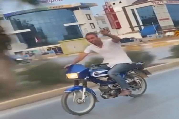 Alkol dolu bardakla motosiklet sürdü
