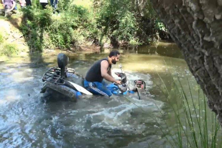 Bursa'da ATV ile bel seviyesindeki sudan geçmeye kalkınca olanlar oldu