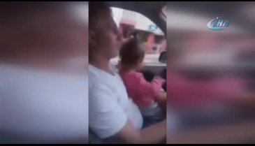 Bursa'da kucağındaki bebekle araba kullandı