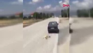 Otomobilin arkasına bağladığı köpeği sürükledi