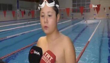 Engelleri kulaçlarıyla aştı