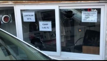 Bursa'da ellerindeki cam kesikleri ele verdi
