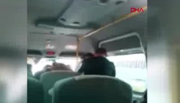 Eşini yolcu minibüsünde yumrukladı