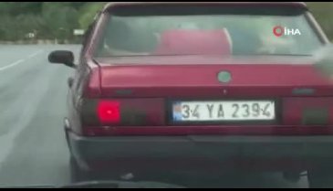 Uyuyan çocuğun tehlikeli yolculuğu kamerada