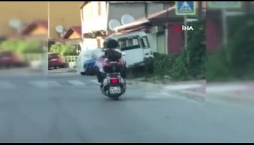 5 kişilik ailenin motosikletle tehlikeli yolculuğu
