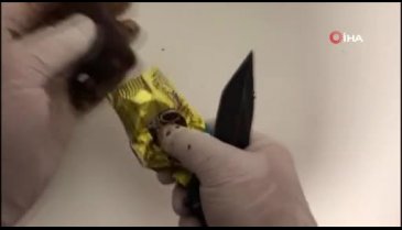 Çikolata paketlerine uyuşturucu sakladı