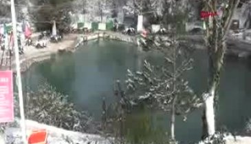 Bursa'da kar altında kaplıca keyfi