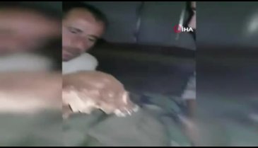 Mezardan kafatası çıkartıp video çektiler