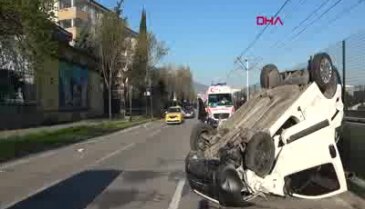 Bursa'da takla atan araçtan burnu bile kanamadan çıktı