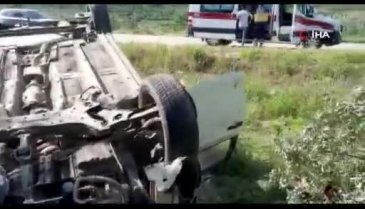 Bursa'da zeytinliğe uçan otomobilde dede ve torunu yaralandı