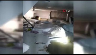 Su basan hastanenin bodrum katında mahsur kalan engelli kadını dalgıçlar kurtardı