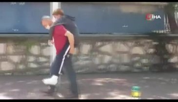 Bursa'da ayağı kırık oğlunu okula kadar sırtında taşıyan baba konuştu