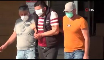 Bursa'da kamyonet çalan şahıs adliyeye sevk edilirken maskeyle gözünü kapattı