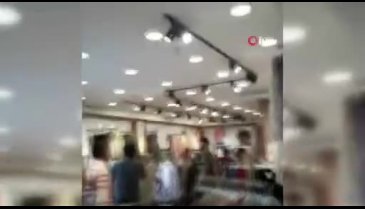 Bursa'da kaçan boğa girdiği giyim mağazasını birbirine kattı