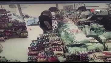 Alkol kutusunu pantolonunun arkasına sokup çaldı