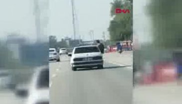 Bursa'da otomobilden sarkıp, tehlikeli hareketler yaptı