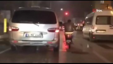 Bursa'da motosiklet üzerinde tehlikeli yolculuk kamerada!