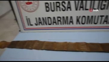 Bursa'da tarihi eser kitabı jandarmaya satarken suçüstü yakalandılar