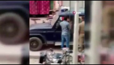Maske takmadığı için ceza kesen polise tokat attı