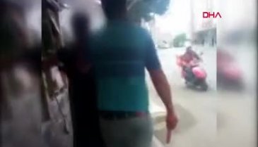 Eşini taciz eden kişiyi sütyen ve etek giydirip sopayla dövdü