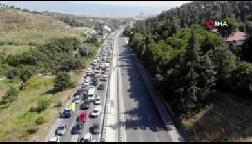 Bursa'da ana yolu trafiğe kapatıp tellere bakım yaptılar