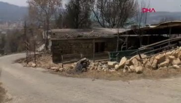 Annesini 600 metre sırtında taşıyıp yanmaktan kurtardı!