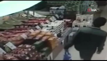 Karnı aç olan hırsız marketten kavurma çaldı