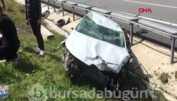 Bursa'da takla atan otomobilden yara almadan kurtuldu